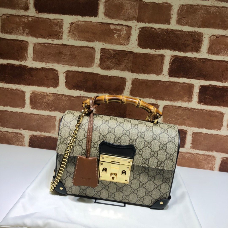 G*u*i top handle bags